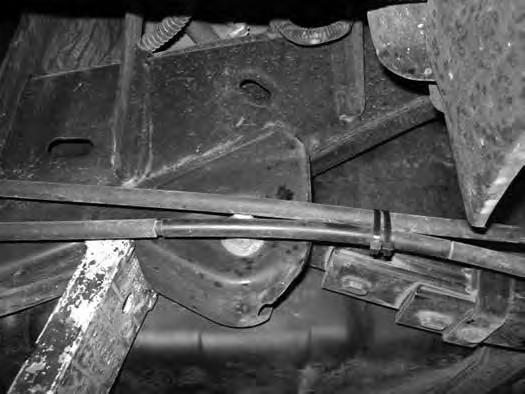 FIG 54 95. Install the brake line relocation bracket to the frame using the factory bolt.