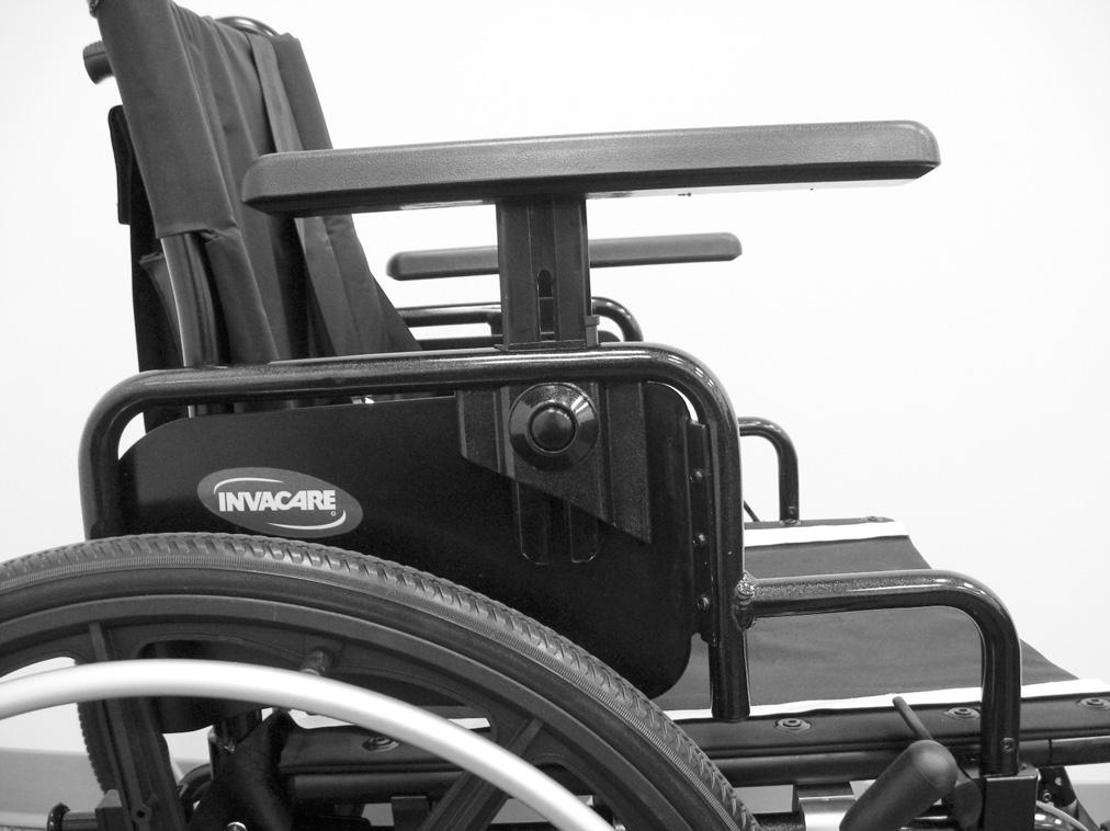 SECTION 5 ARMS Using Flip Back Armrest NOTE: For this procedure, refer to FIGURE 5.2. 1. Unlock the flip back armrest by pressing the release lever toward the front of the wheelchair. 2.