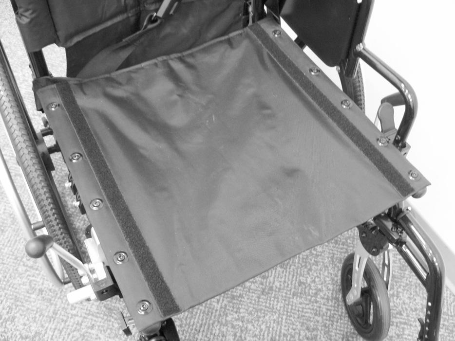 Pull the back canes out of the wheelchair frame. 4. Pull the back upholstery down and off the back canes.