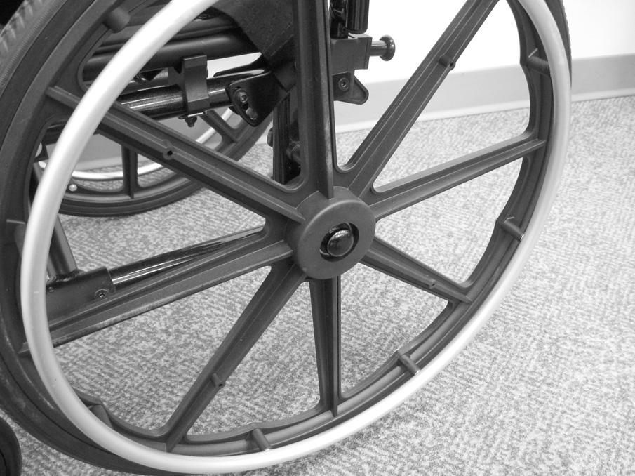 SECTION 7 REAR WHEELS DETAIL A Rear Wheel Quick Release Axle DETAIL B Rear Wheel Quick Release Axle Button Wheelchair Frame