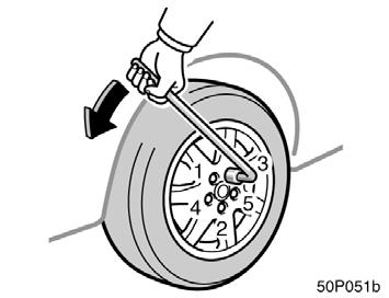 When installing the jack box, align the arrows on the jack box with the ones on the body. Blocking the wheel 50p011b Loosening wheel nuts 50p051b 2.