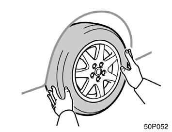 Changing wheels Never get under the vehicle when the vehicle is supported by the jack alone. 50p052 50p017c 6. Remove the wheel nuts and change tires. Lift the flat tire straight off and put it aside.