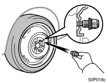 Reinstalling wheel nuts Lowering your vehicle 50p018c 7. Reinstall all the wheel nuts finger tight. Reinstall the wheel nuts (tapered end inward) and tighten them as much as you can by hand.