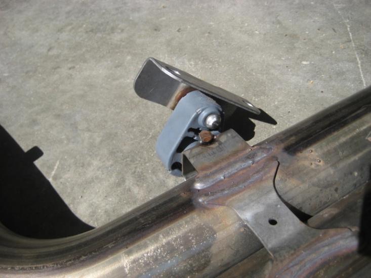 Remove exhaust hanger and bracket from stock midsection using grommet pliers or
