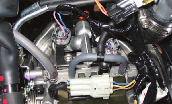 FIG.D Unplug Unplug Unplug 8 Locate the throttle body which is under the fuel tank.
