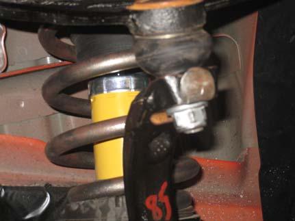 (See Photo 5) Note: Be careful when lowering the spindle, and take care not to stretch or damage the brake