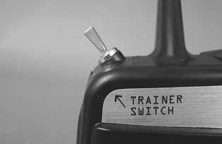 TRAINER SYSTEM The Tactic transmitter is equipped with a trainer system that, when used with another Tactic or Futaba transmitter, can transfer airplane control to a second pilot for learning
