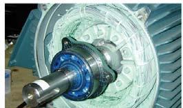 The rotating shaft of a motor is suspended in the end bells by bearings that provide a relatively
