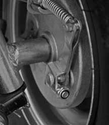 After any adjustment of the brake, check again to make sure the front wheels cannot turn when the brake is applied.
