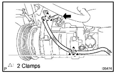 Remove the nut and disconnect the suction hose sub-assy from the compressor and