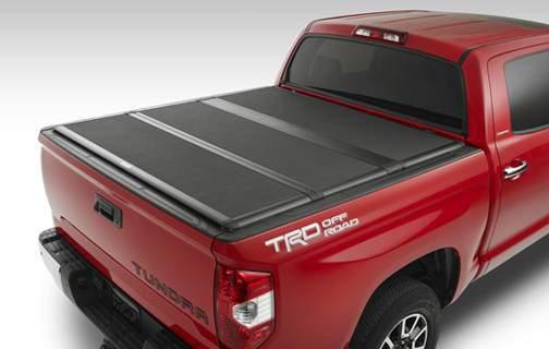 - The hard tri-fold tonneau cover adds extra security with five rotary latches, so you can rest assured that your cargo is protected.