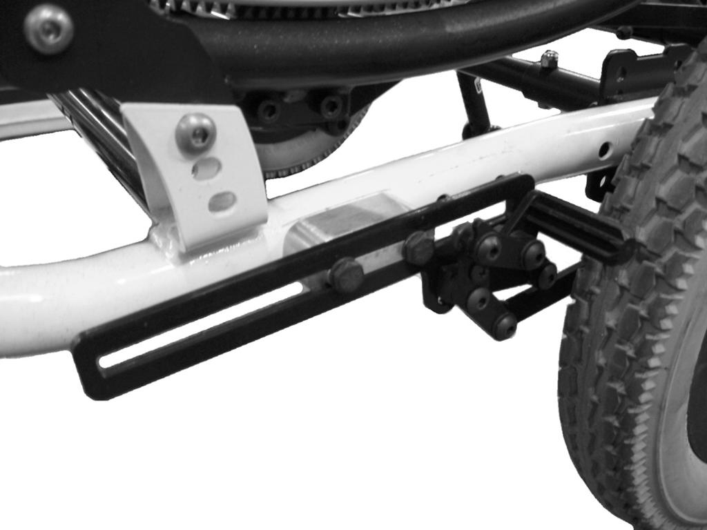 16 WHEEL LOCKS/ANTI-TIPPERS B. Slide the wheel lock bracket along the wheelchair frame until the measurement between the wheel lock shoe and rear wheel is approximately 1.25 inches. C.