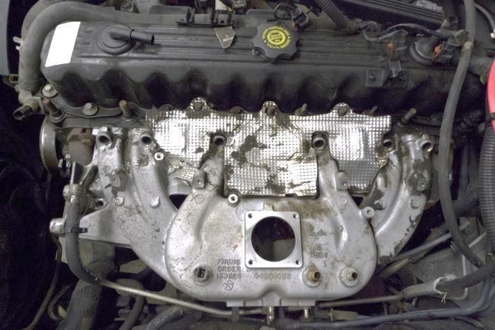 11.5. After removing fuel rail, fuel injectors and wire housing engine should look