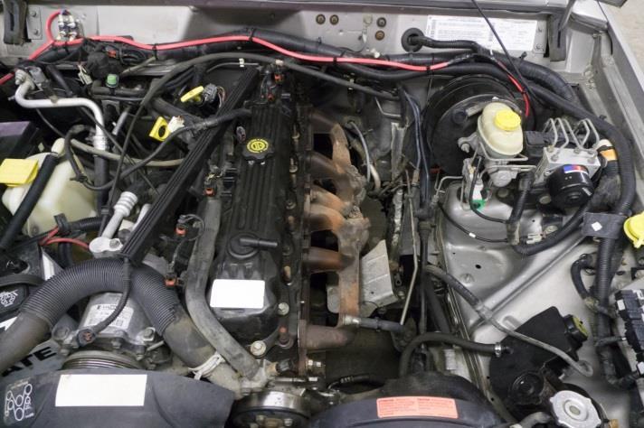 13. With stock parts removed (other than power steering components) engine bay should look similar to Figure 28 13.1. Check the condition of hoses/lines on engine 13.1.1. Coolant hoses 13.1.2. Vacuum hoses/lines 13.