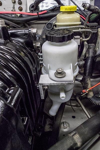 23. Install provided power steering reservoir (Figure 50) or (Figure 51) 24.