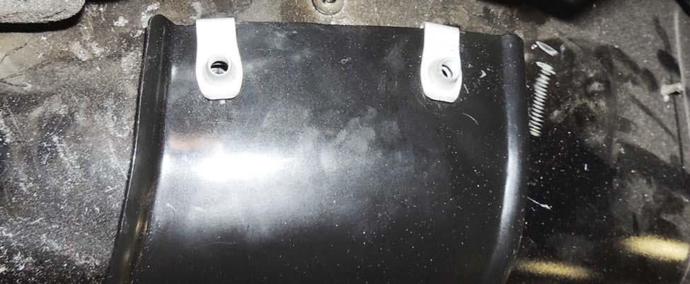 Apply a light application of undercoating to the drilled holes. NOTE: RH side shown, LH side similar.