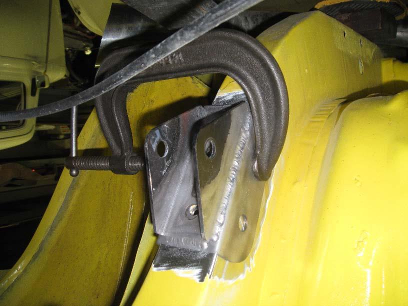 Weld the bracket to the frame rail as shown below.