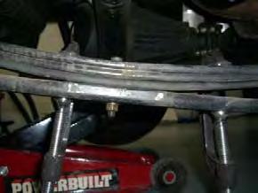 With a small amount of grease applied to both ends of the Add-A-Leaf, re-assemble leaf springs with Add-A- Leaf in place.