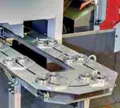One possibility is the standard linking system from EWAB with spring-operated pick up stations, including 2 workpiece