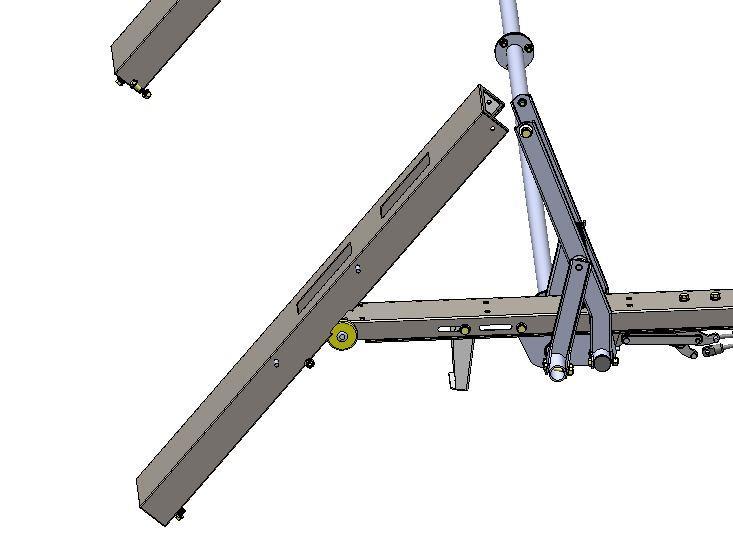 As you lower the Pan assembly onto the rollers, remove the bolt assembly pre-installed on Ladder Pan, and use the same bolt