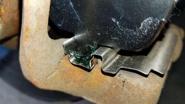 You want to make sure there is plenty of grease here so that the new brake pad