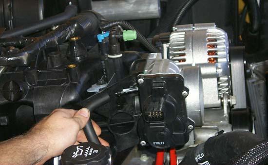 44. Remove the PCV vent hose from the throttle body or intake