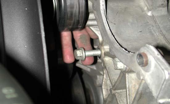 Remove the one bolt directly below the alternator and factory GM
