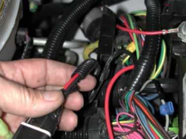 Install the wiring harness for the fuel pump in the same location as you did for the intercooler pump wiring harness.