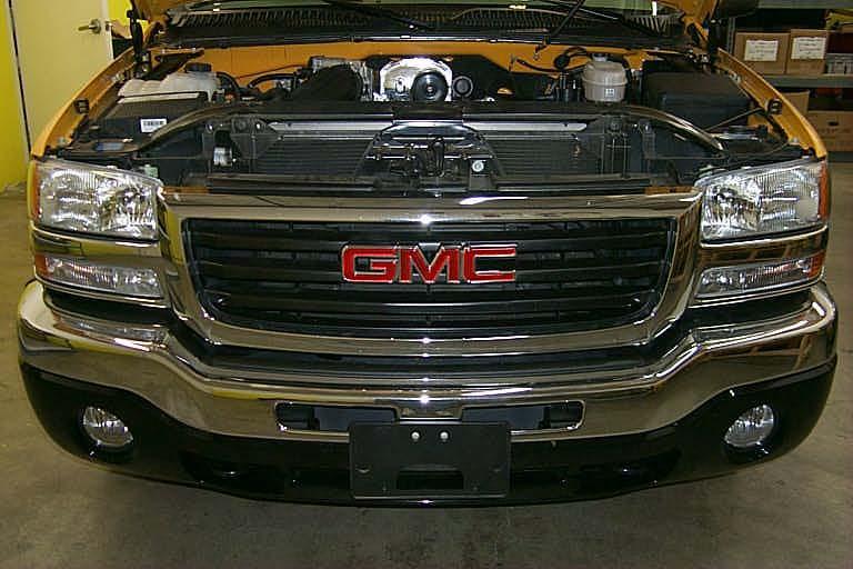 Pull out on the grille assembly at