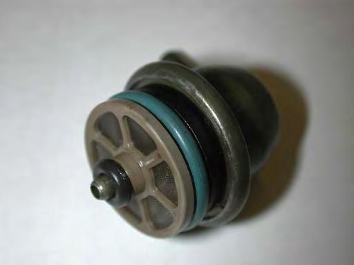 Remove the stock fuel pressure regulator from the fuel rail by disconnecting the vacuum hose,