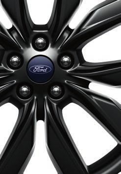 Outside, gloss black-painted accents complement 19" Ebony Black-painted aluminum wheels and