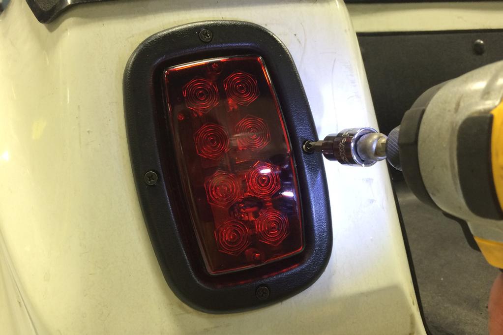 7 Insert tail light and attach tail light to cart using