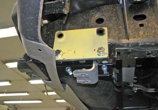 Ford F-150 Raptor SVT continued 7. Align the baseplate with the existing holes in the tow hook bracket.