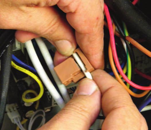 To use the wire tap splice terminal first place around wire