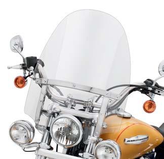 The shield should manage airflow and wind blasts to create a pocket of still air for both rider and passenger comfort.