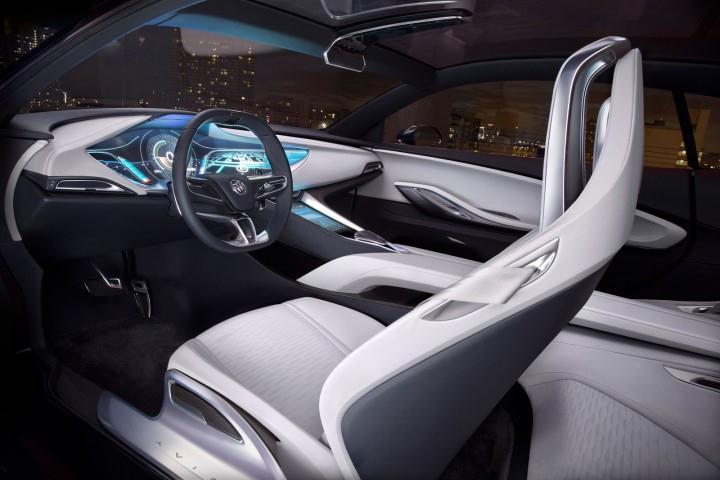 The center console also incorporates touchscreen controls and extends to the rear seating area.
