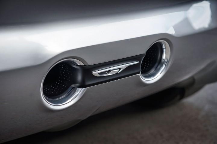 Opel previews the new GT Concept The latest teaser image shows a central double exhaust, and while Opel claims the car s design is in no way retro, the feature was a highlight the concept cars from