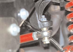 Insert poly end into the OEM steering damper location on passenger side of axle, NOT Photo #8 the original track bar location.