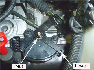 cm) RANGE SWITCH ADJUSTMENT: 11. Loosen the two 10 mm mounting bolts. 12. Disconnect the shift cable at the lever. 13.