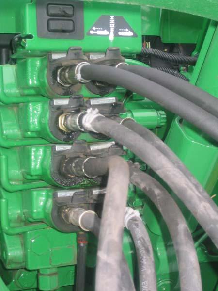 ATTACHING AND DETACHING ATTACHING HYDRAULIC AND ELECTRICAL SYSTEMS: Harvesters are available with ISO couplers or metric adapters.