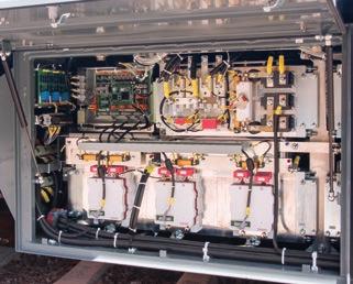 A voltage of 750 v DC is provided from a third rail to the car using four traction collectors.