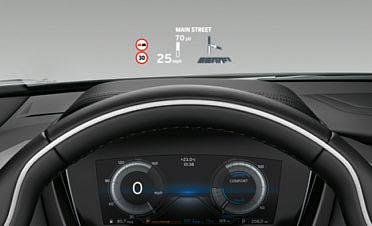 i8 embossing as well as Alcantara separating elements in the storage compartments behind the