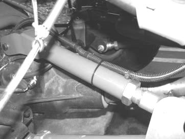 25. Attach the assembled upper link arm to the lower link arm that is already installed on the Jeep using the supplied 7/16 x 3 ¼ hardware.