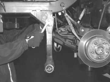 Using two ratchet straps or two jack stands support the rear axle, do not allow it to hang freely. 47. Locate and remove the factory sway bar end links, discard end links and save hardware. 48.