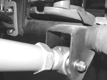 MAKE SURE WHEN INSTALLING THE LINK ARMS THAT THE GREASE FITTINGS ON THE PIVOTS ARE FACING UP. SEE PHOTO BELOW. Cut Here Axle Mount Shown With Grease Fitting Facing Up 70.