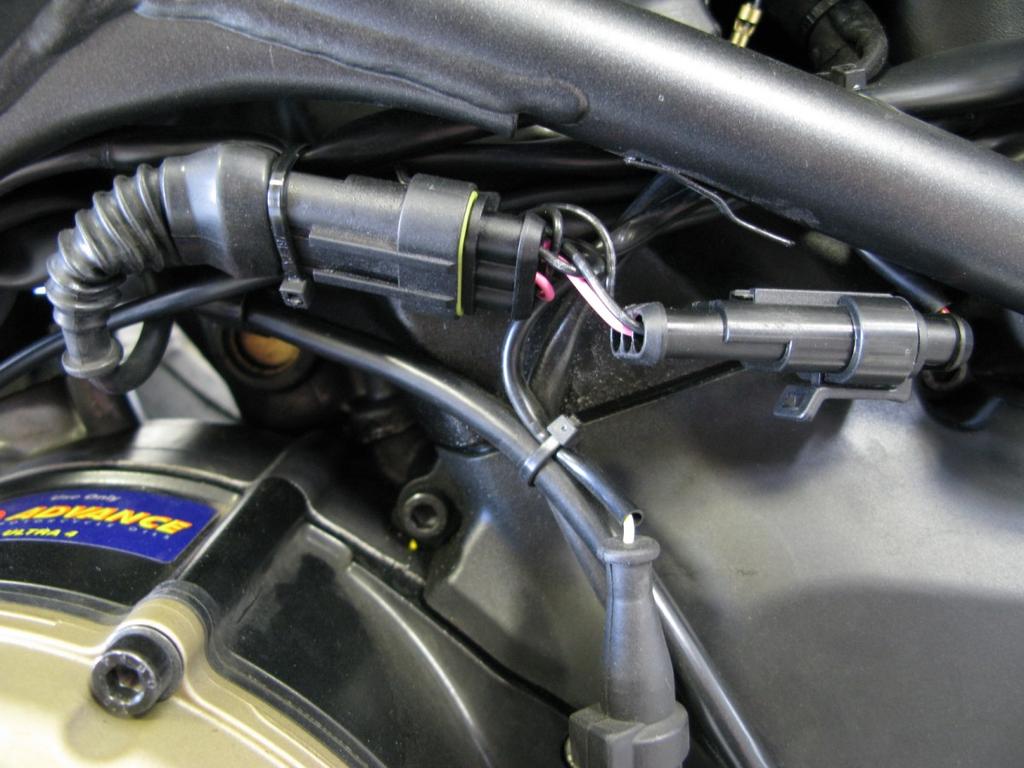 7. Locate the Speed connectors which can be found inside the right frame rail.