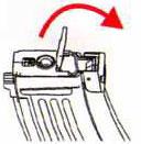 Replace the magazine cover Move the gear with hand clockwise until it is fully wound, and the