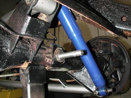 Attach shock T-Bar to frame using 3/8 x 1 ¼ bolts, Nylok nuts and flat washers. 2.
