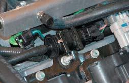 78. Assemble the EVAP system by cutting the vacuum line from the small inlet manifold barb to the bypass
