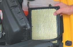 Replace the air box cover, tighten the three fasteners and place the K&N Warning label on the